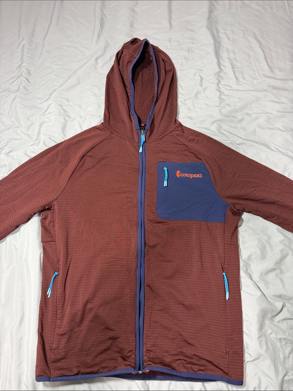 cotopaxi Men’s Medium Rust Hooded Performance Jacket with Navy Chest Pocket